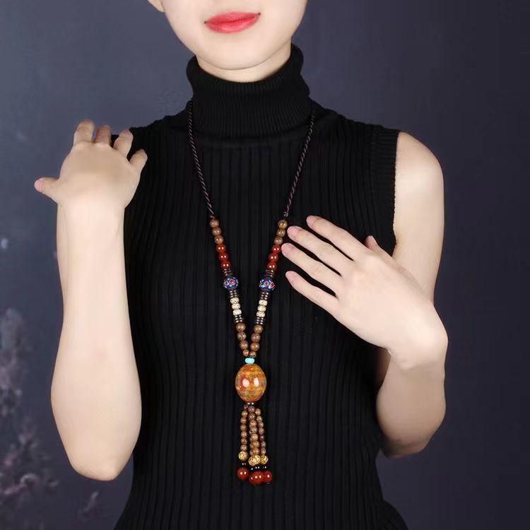 GEMCHIC Women s Ethnic Style Long Sweater Necklace with Ceramic Pendant and Tassel Beads, Adjustable Winter Fashion Jewelry
