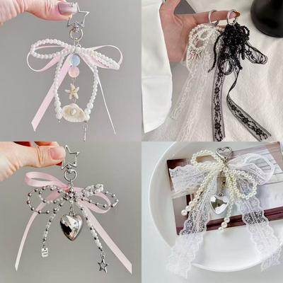 Korejský krajkový mašlový přívěsek na tašku korálková perlová mašle šperky doplňky ins styl klíčenka láska