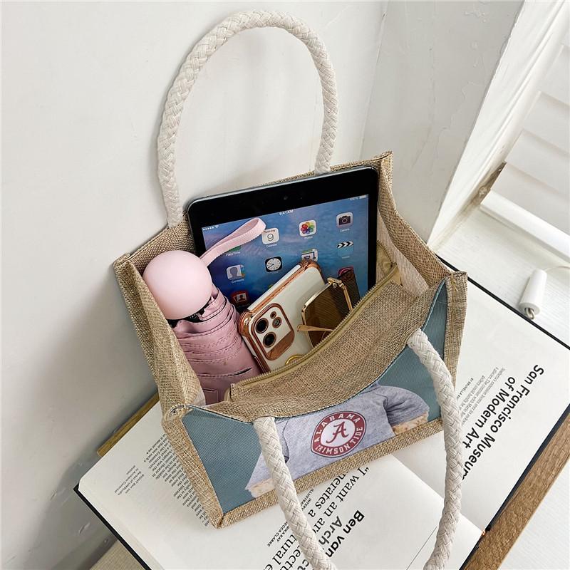 Cute hand-held lunch box lunch bag for women 2025 new Korean version ins student versatile Internet celebrity handheld canvas bag