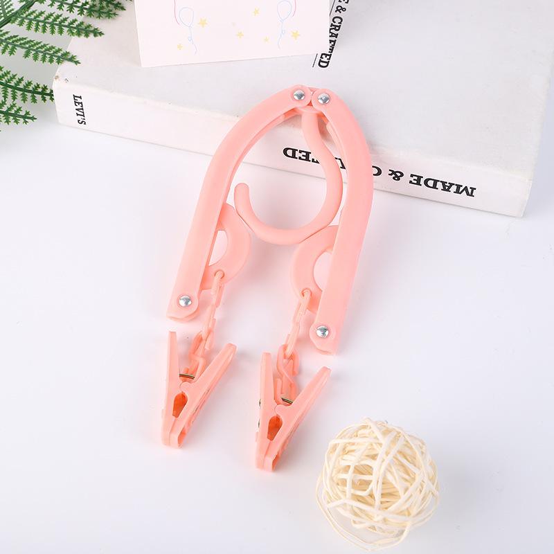 Multifunctional Non-Slip Folding Clothes Hanger & Drying Rack for Travel, Dormitory, or Hotel.