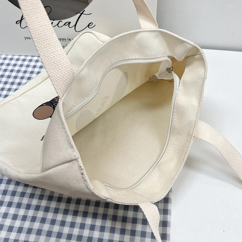 Large capacity canvas bag casual shoulder bag new fashion Harajuku simple cartoon cute tote bag