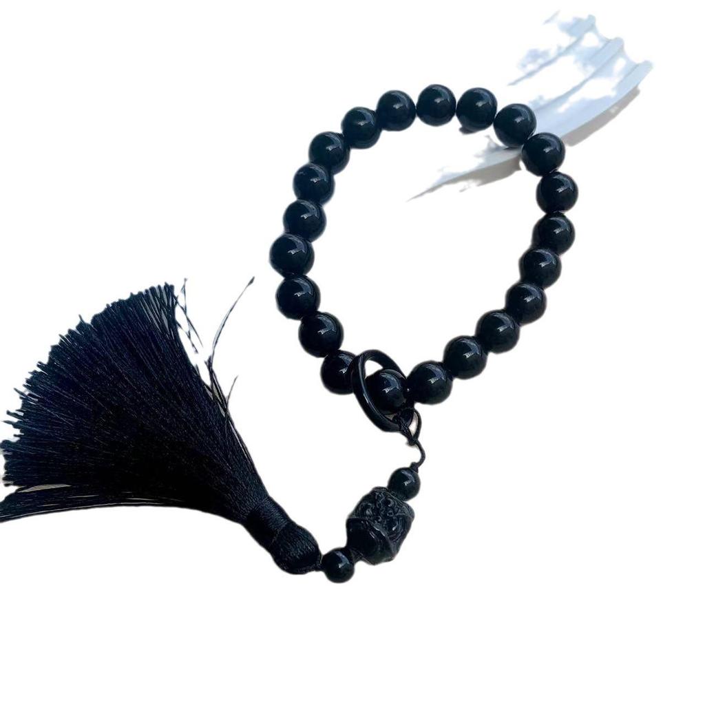 Obsidian Gradient Tassel Jade-Style Phone Charm with Antique Lion Dance Design