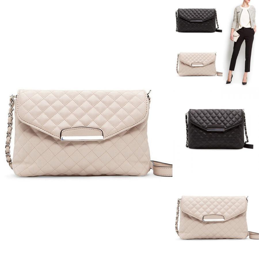 Versatile Women's Leather Clutch Handbag With Classic Appeal And Adjustable Strap