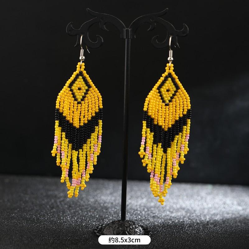 

Популярные длинные серьги с бахромой из рисовых бусин ручной работы, богемные, ретро, нишевые, для личности и темперамента, отпускные серьги