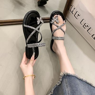 Sommer neue coole Hausschuhe flachsohlige Mode Damen Strasssteine mit römischer Flut Schleife Ein-Wort Strand Damenschuhe