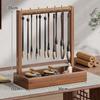 Solid Wood Calligraphy Brush Holder: Desktop Pen Rack with Scholar's Treasures Ornament and Metal Hook Design.
