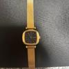 Used Gold mesh band square watch