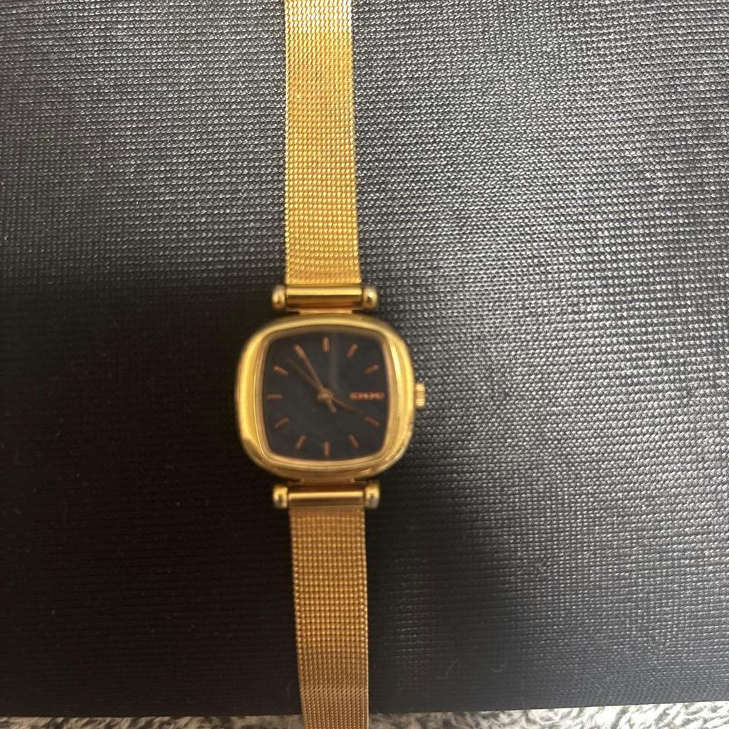 Used Gold mesh band square watch