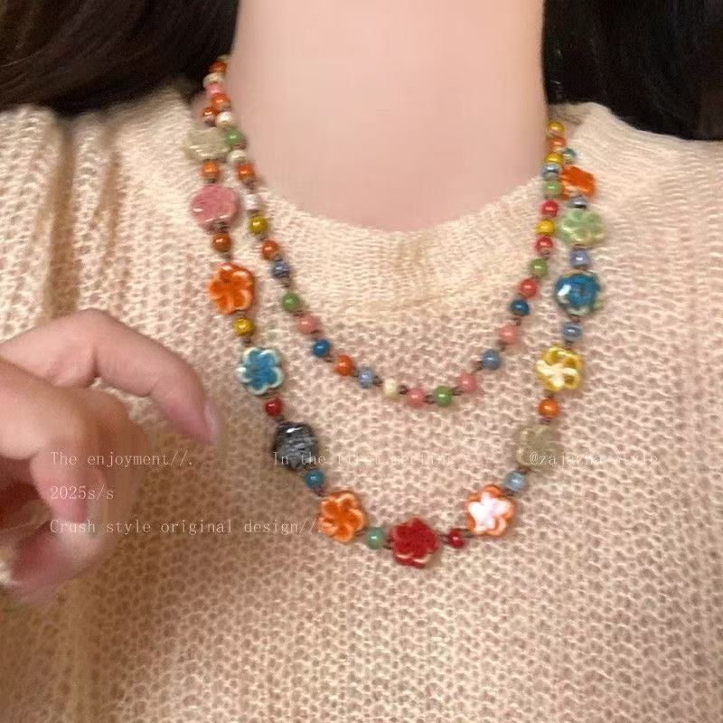 Color ceramic flower necklace women's new popular new Chinese sweater chain long beaded woven rope accessories