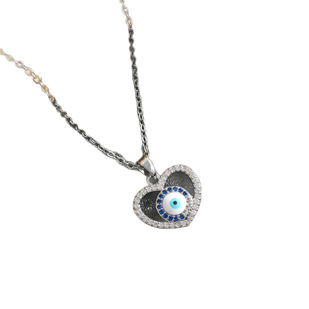 European and American Women's Heart-Shaped Devil's Eye Pendant Necklace - Versatile Retro Copper Jewelry