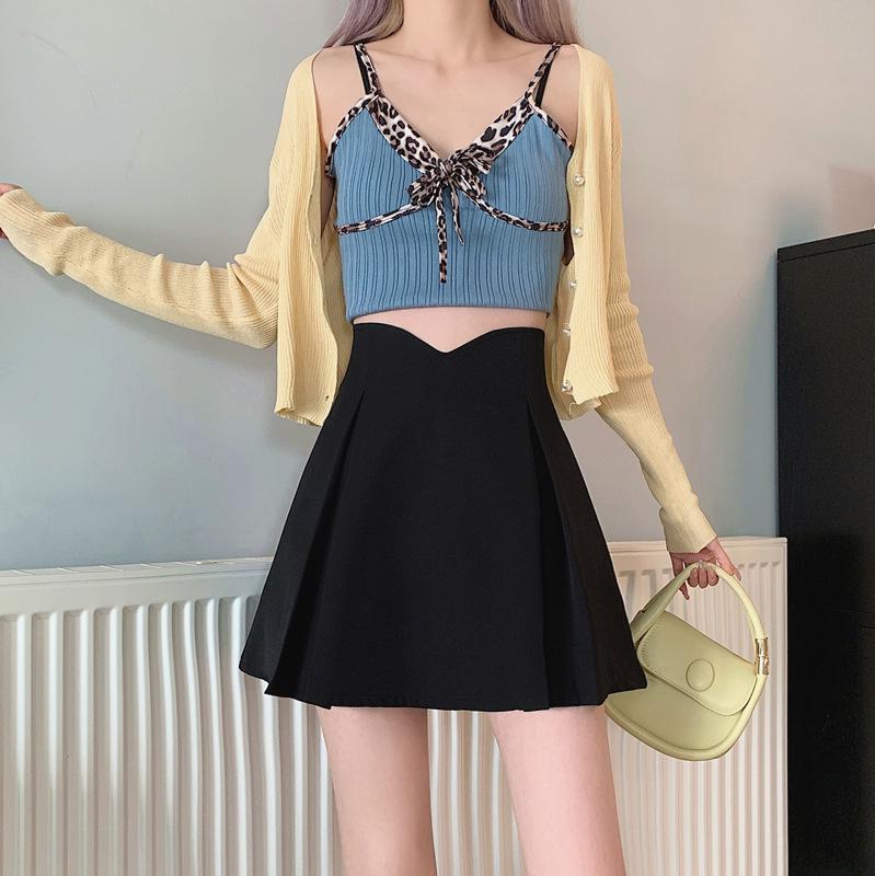 

Women s Black Irregular A-line Skirt: High Waist, Pleated, Midi-Length for Spring Season. S