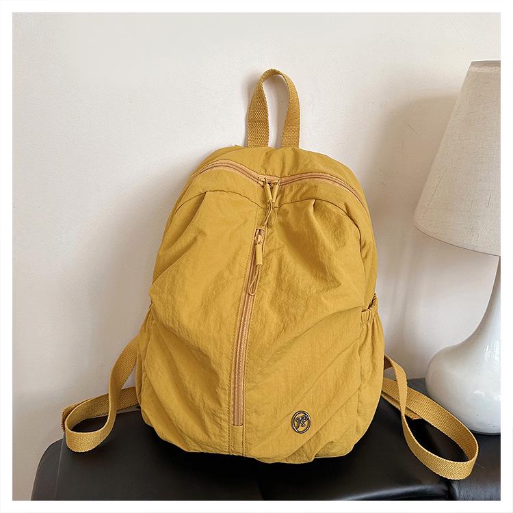 

Retro Outdoor Mountaineering Backpack: Lightweight, Versatile, Minimalist Bag for Travel, School, Men & Women. помаранчевий