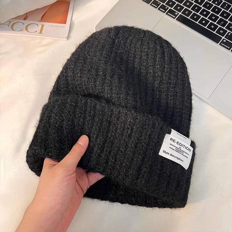 The New Woolen Hat Shows Off Your Face. It's A Trendy Knitted Hat with A Fabric Patch for Warmth Ear Protectors and Headscarves