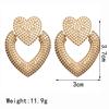 Neue Damenmode Liebe Herzförmige Ohrringe Metall Retro Hohle Doppelherz Ohrringe Schmuck