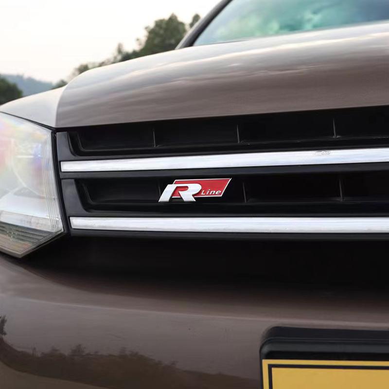 AGLNX1 1Pcs ABS Metal Logo Car Front Grille Badge Decoration Sticker Auto Accessories For VW RLine R Golf Amarok T5 Teramont ID3 Tiguan