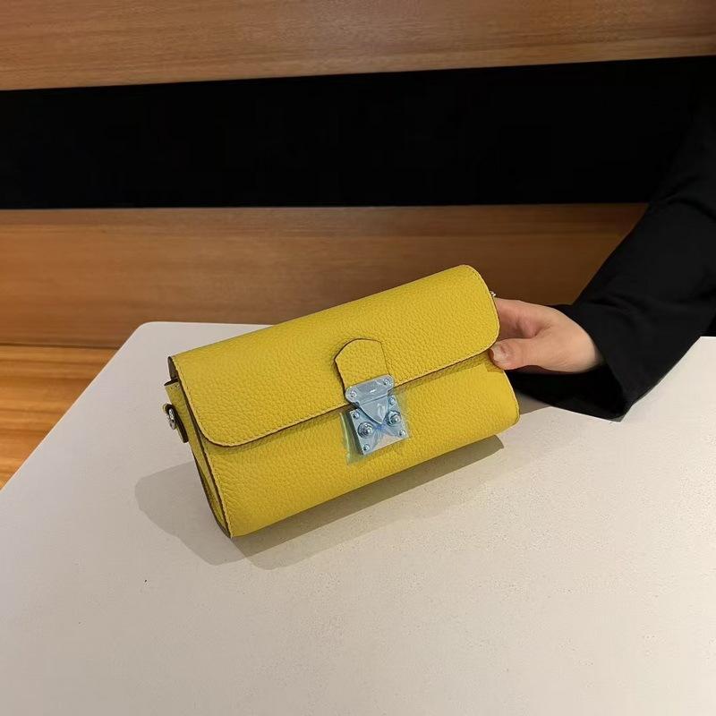Leather women s bag first layer cowhide envelope bag shoulder messenger bag unisex жёлтый
