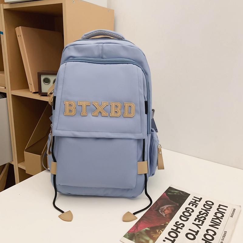 

Школьный рюкзак высокая ценность буква сзади пара однотонный повседневный простой легкий уличный большая вместимость