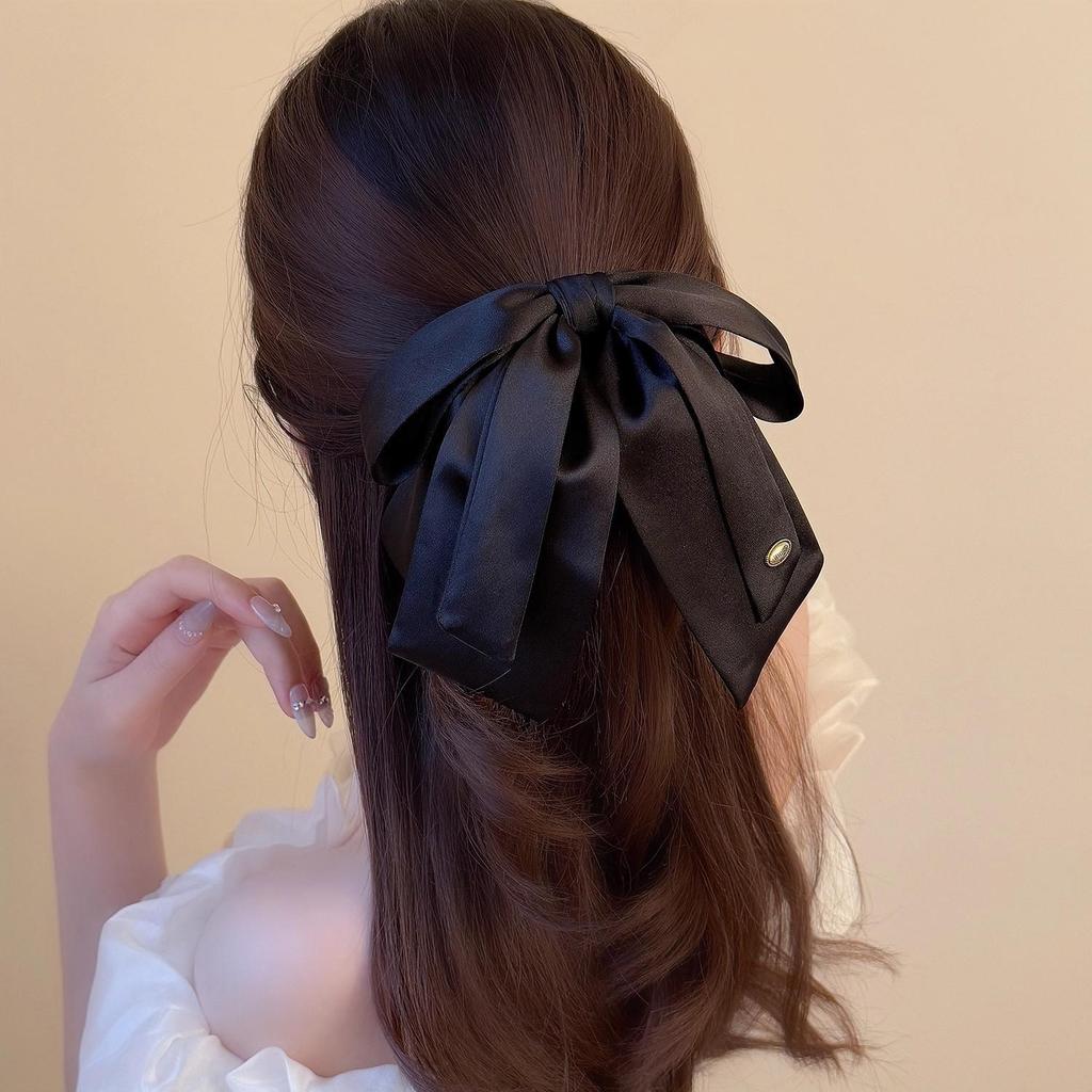 Luxuriöse Satin-Schwarze Schleife Pferdeschwanz Krallenklemme mit Goldetikett für Elegante Hochsteckfrisur