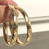 Gold earrings, large round style, electroplated round texture design, eye-catching earrings.