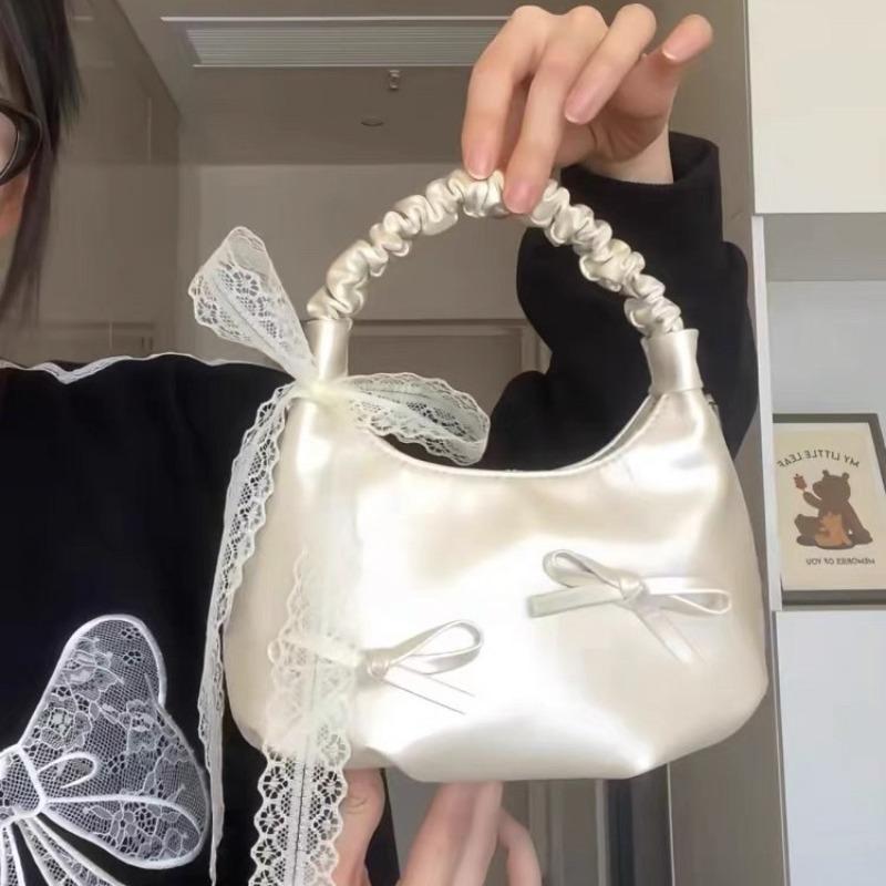 Niche design bow bag, new French portable cloud bag, high-end shoulder messenger bag for women