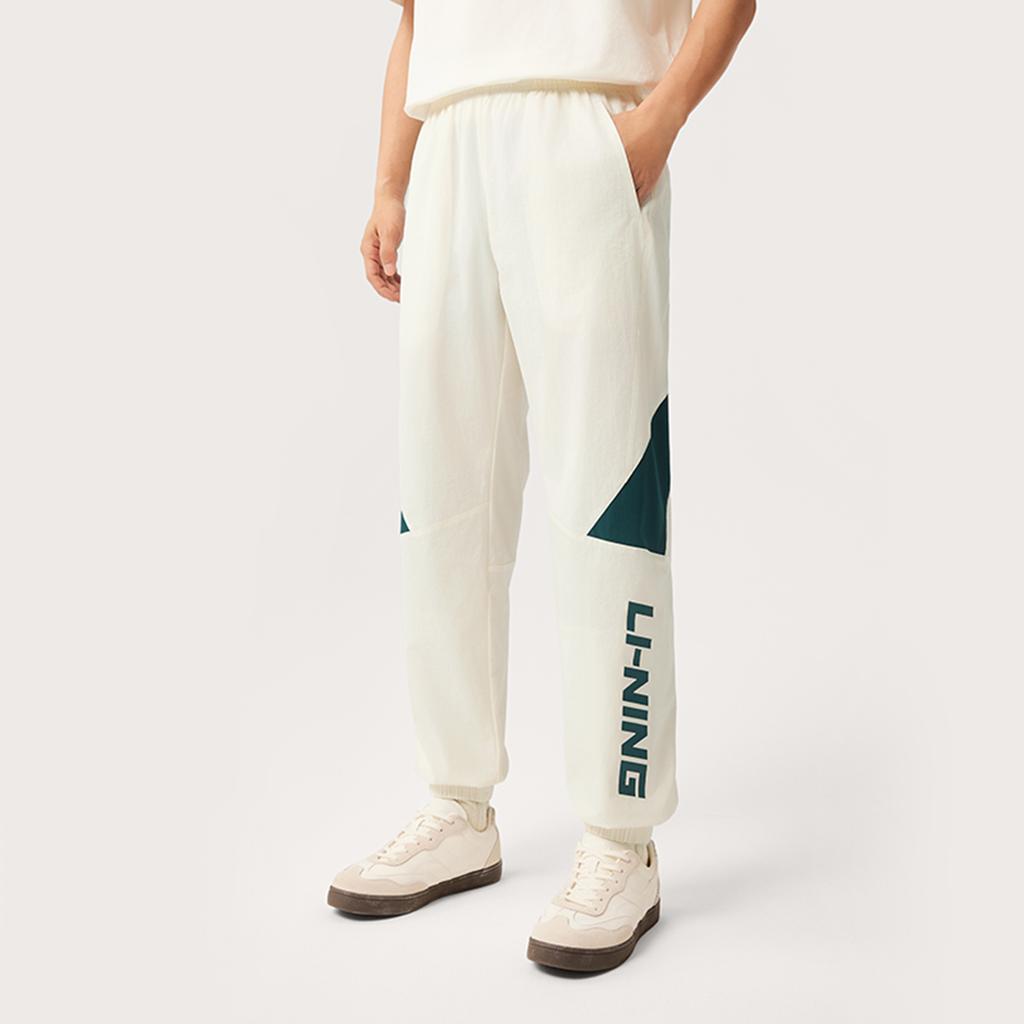 Li Ning Sports Trend Series Casual Versatile Comfortable Simple Color Block Elastic Cuffed Lace-Up Knitted Sports Pants Men pants Off-White AYKV161-4