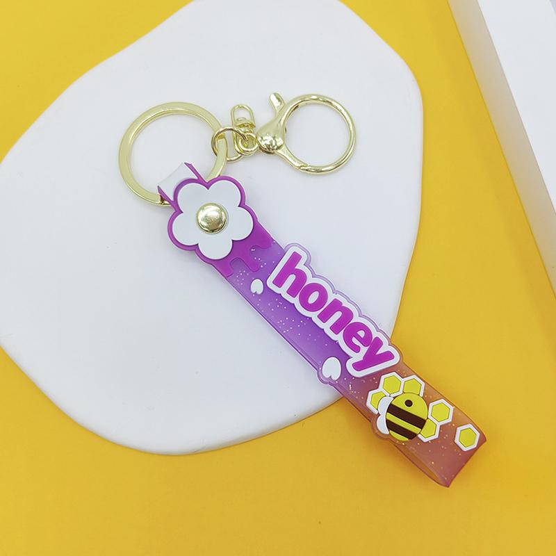 Transparent Pvc Soft Rubber Rope Keychain English Small Flower Jelly Color Plum Blossom Candy Color Drop Adhesive Wristband