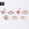 European and American new dripping butterfly imitation gemstone and diamond ring set Geometric twist ring seven-piece set