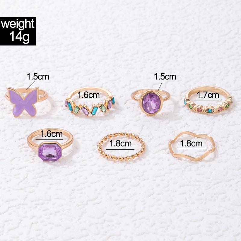 European and American new dripping butterfly imitation gemstone and diamond ring set Geometric twist ring seven-piece set