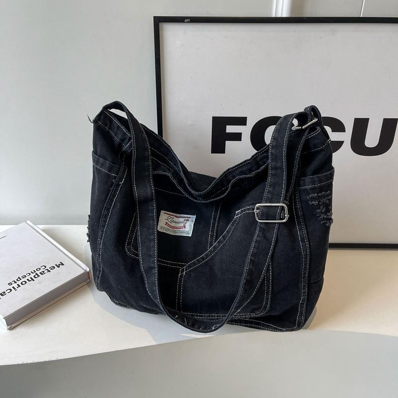 Hong Kong style denim messenger crossbody bag, casual single shoulder bag for women, fashionable design commuting bag.zwq