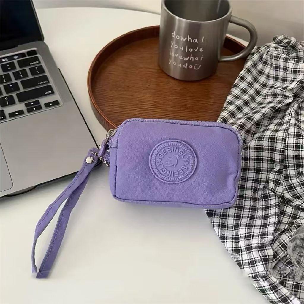 

Компактный нейлоновый кошелек для монет и держатель для ID - Хранение помады, пудры, наушников 8*12cm Multi-layer Storage Bag