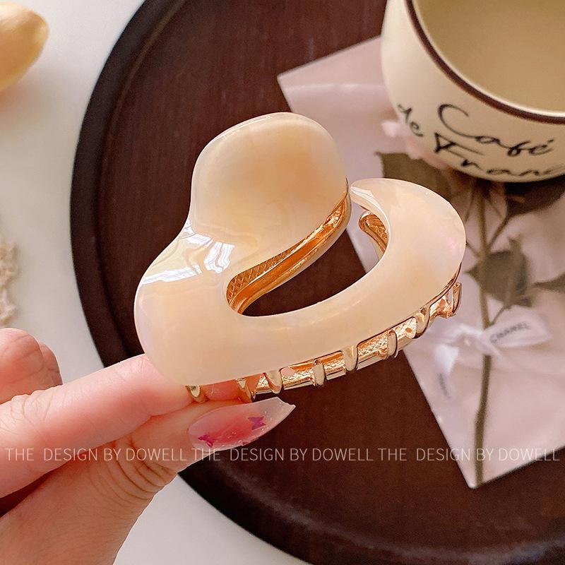 

Geometric Elegant Design Medium Shark Hair Clutch For Fashionable Ladies In Colors Assorted Beige