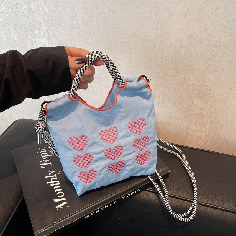 2025 Eco-friendly Japanese Embroidery Handbag: Spring Women's Fashion Cloth Bag – Shoulder, Crossbody, or Shopping Use.