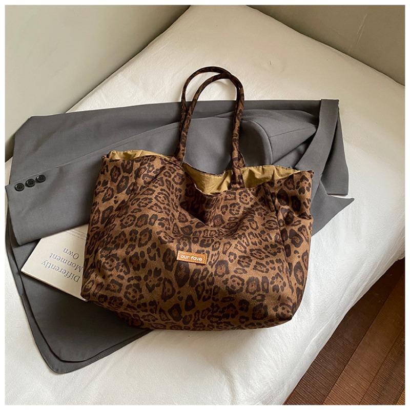Autumn new niche leopard print canvas bag women's large capacity reversible shoulder bag simple casual commuter bag for work