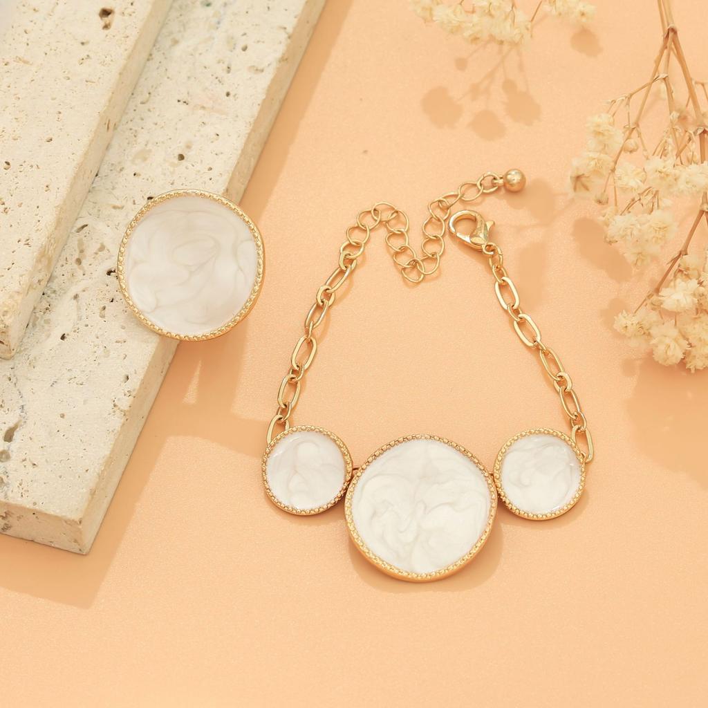 Jewelry niche design sense irregular round dripping oil white bracelet necklace stud earrings ring set