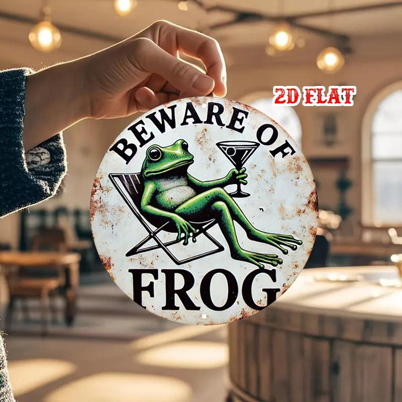 A Humorous Round Sign Featuring a D Flat Design of a Frog Perfect for Decorating Walls with a Cocktail Glass Theme