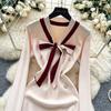 Xiaoxiangfeng advanced sense contrasting color bow strap long-sleeved dress women's metal buckle waist thin knitted skirt