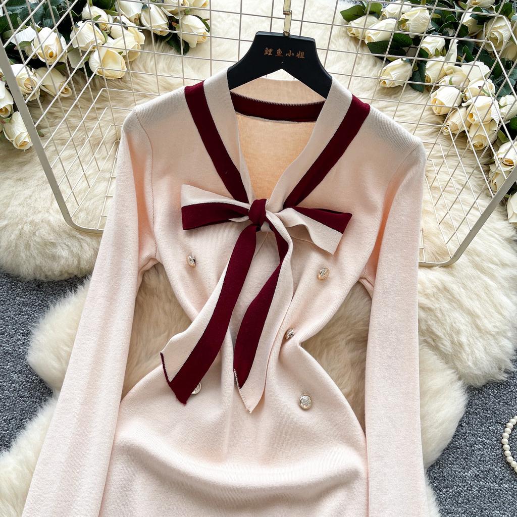 Xiaoxiangfeng advanced sense contrasting color bow strap long-sleeved dress women's metal buckle waist thin knitted skirt