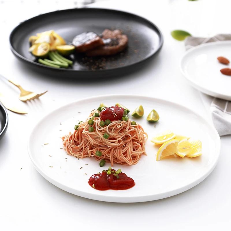 10 Zoll Keramik schwarz-weiß Western-Stil Steakplatte Kommerzielles Geschirr Modernes Haushalts-Rundes Sushi-Salat-Teller