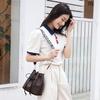 Retro One-shoulder Crossbody Bucket Bag, a New Pumping Belt Casual Women's Bag.