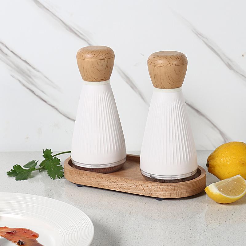 

2Pcs ABS+PS+Wood Pepper Grinder Kitchen Sea Salt Pepper Manual Grinder with 1 Base (BPA-Free,No FDA Certification) Ordinary Type