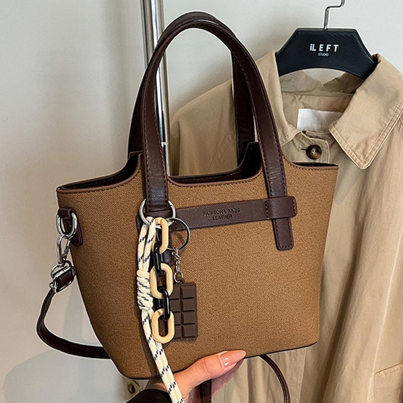 

Niche bags women s autumn and winter versatile new messenger bags women s portable bucket bags коричневый