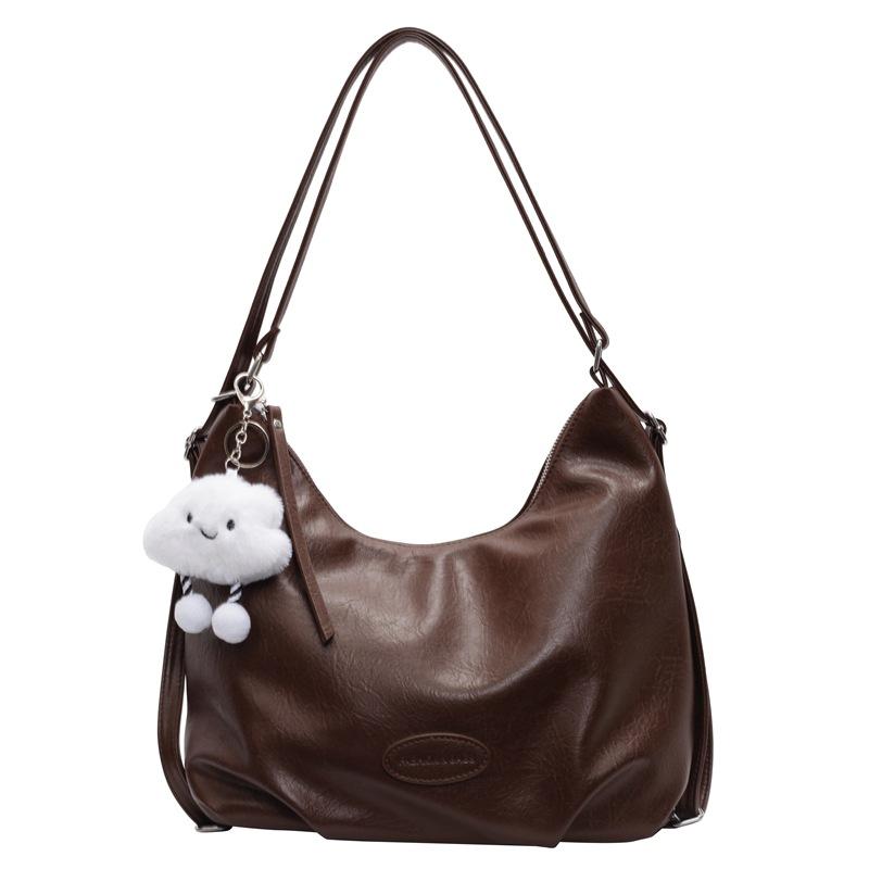 

Premium sense large capacity double shoulder bag women 2025 new fashion texture shoulder bag versatile commuter tote bag with pendant