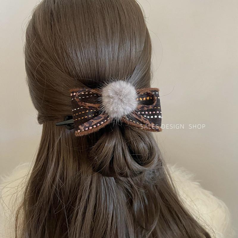 Autumn/Winter Pompon Bow Twist Hair Clip: Versatile Fashion Accessory for Updo Styles
