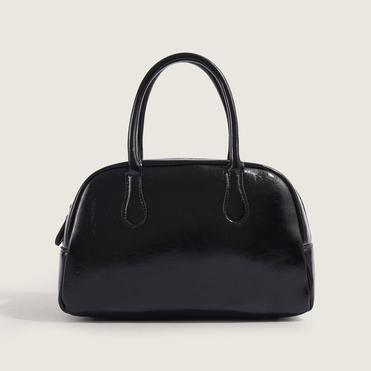 

2025 New Korean Dongdaemun Niche Handheld Pillow Bag for Women Simple Texture Commuter Handheld Boston Bag чорний
