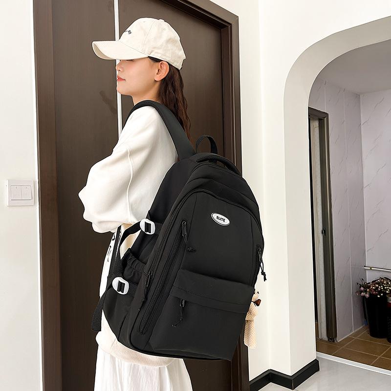 Schoolbag new schoolbag simple, lightweight and versatile large-capacity backpack junior high school student college student niche fashion backpack