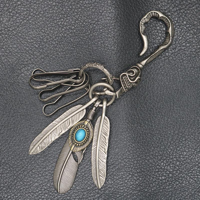Antique Silver Skull Keychain with Turquoise Accent and Feather Cowhide Trim
