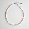 Heart clam with pearl necklace