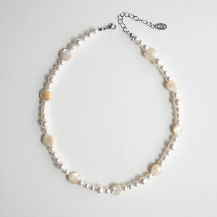 Heart clam with pearl necklace
