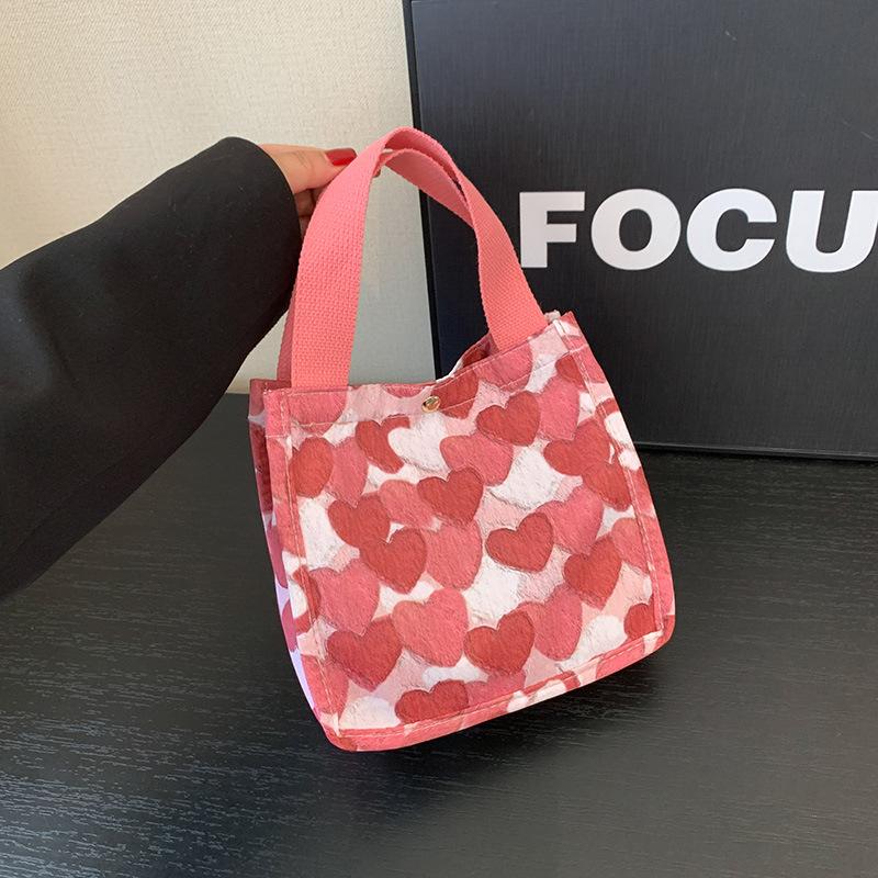 Large-capacity bag women's 2025 spring and summer new cute versatile shoulder bag love portable commuter tote bag