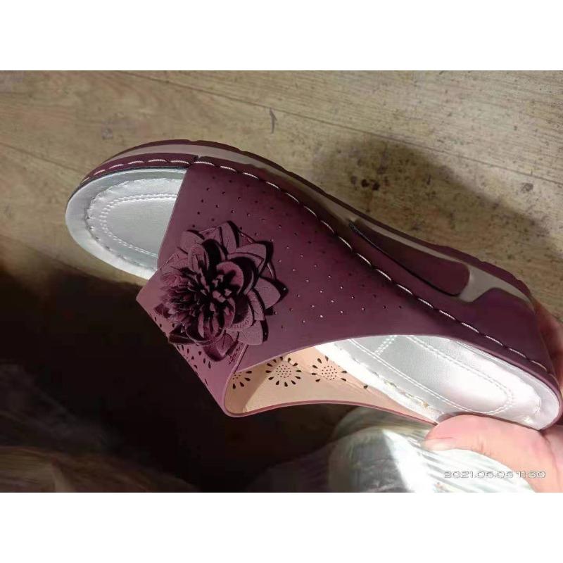 Large size slope heel slippers women's summer new hollow flower flat bottom one-word cool slippers beach women's shoes